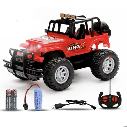 Red and black remote control toy car with accessories on a white background
