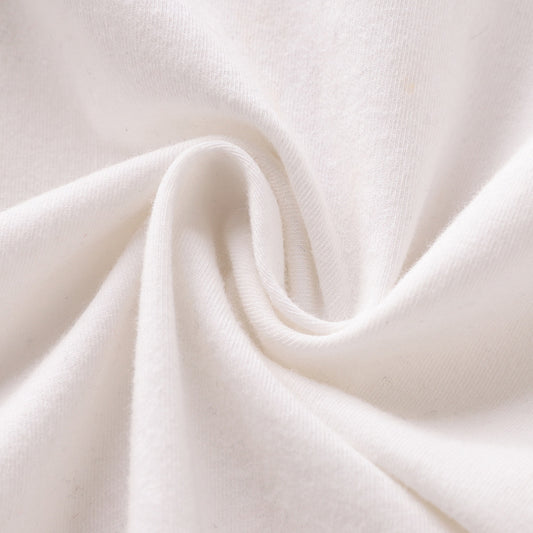 Close-up of white fabric with folds