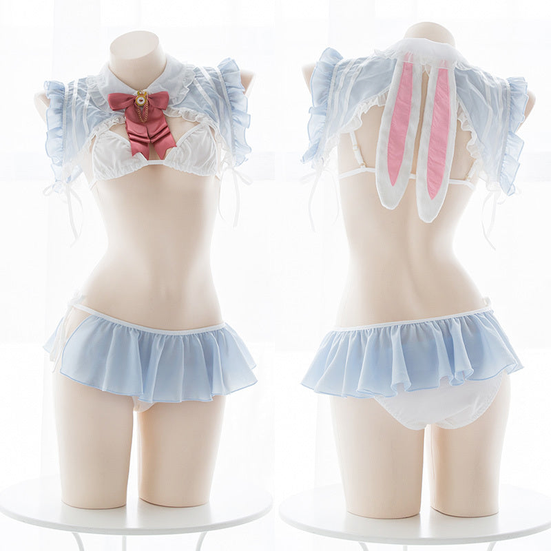Pastel-colored bunny costume with ruffled collar and ears on mannequins.