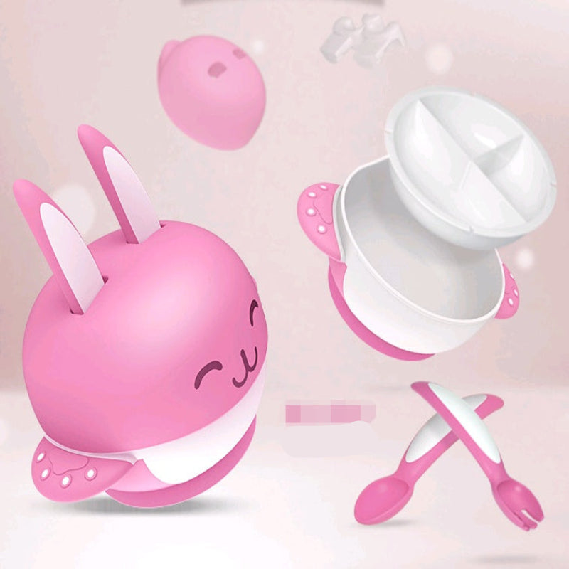 A pink rabbit-shaped baby bowl with detachable parts, including a handle and a lid, displayed against a white background.