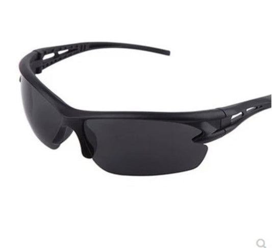 A pair of black sports sunglasses designed for outdoor activities, featuring a wraparound design and UV protection lenses.