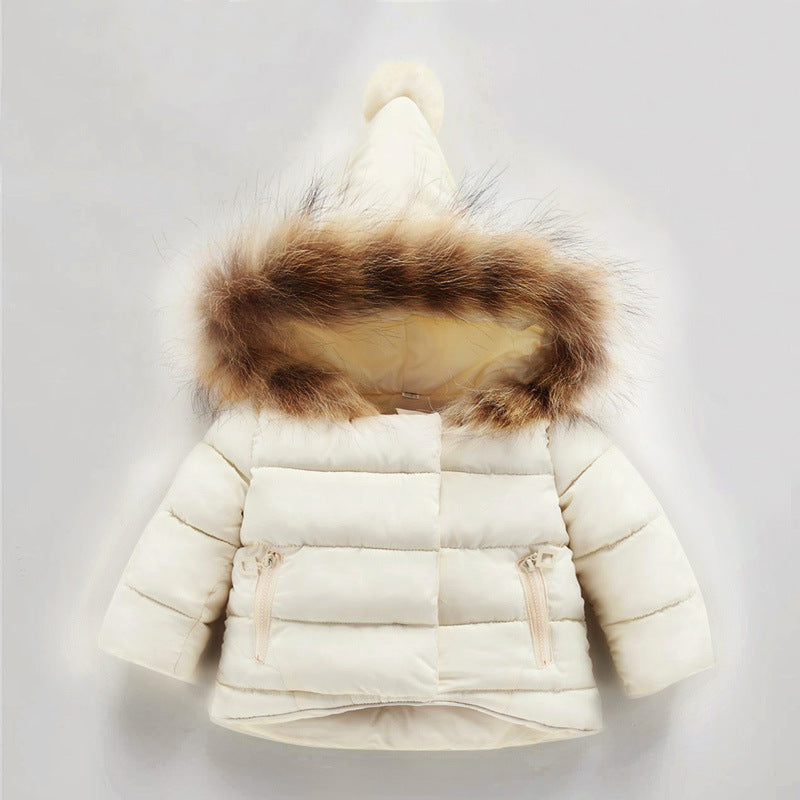 White puffer jacket with brown fur hood on a light gray background