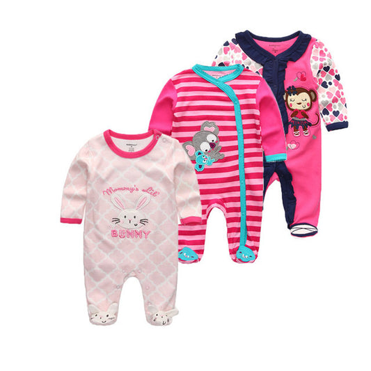 Three baby onesies with different designs on a white background