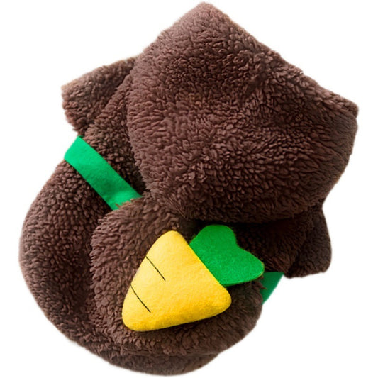Brown plush slippers with a yellow and green design on a white background