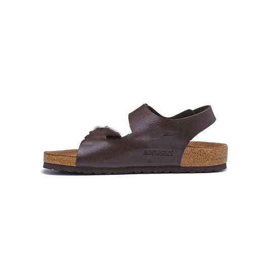 Brown sandal with cork sole on a white background