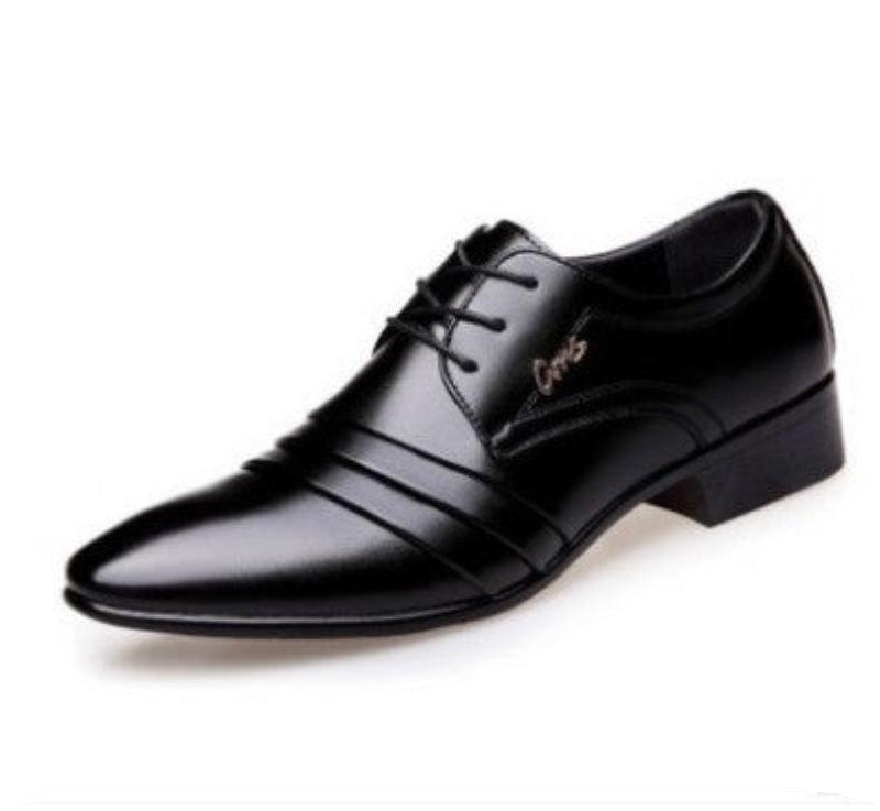 A black leather men's shoe with a pointed toe and lace-up closure, displaying the brand name on the front.