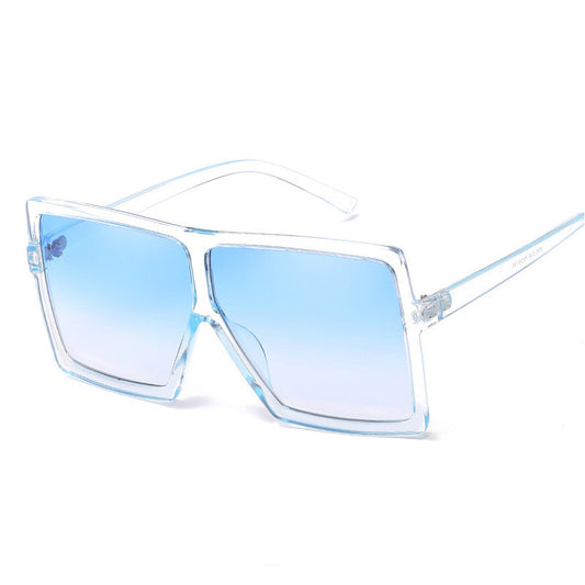 Sunglasses with blue gradient lenses on a white background
