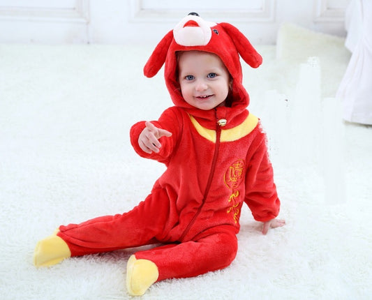 Child wearing a red dog costume with yellow accents on a white background