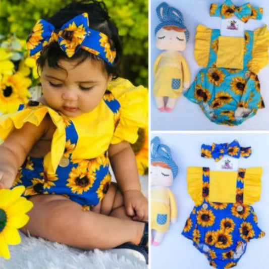 Baby in sunflower-themed outfit with matching headband, surrounded by babydoll outfits on a white background.