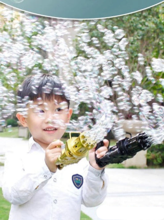 Child playing with bubble gun surrounded by bubbles outdoors