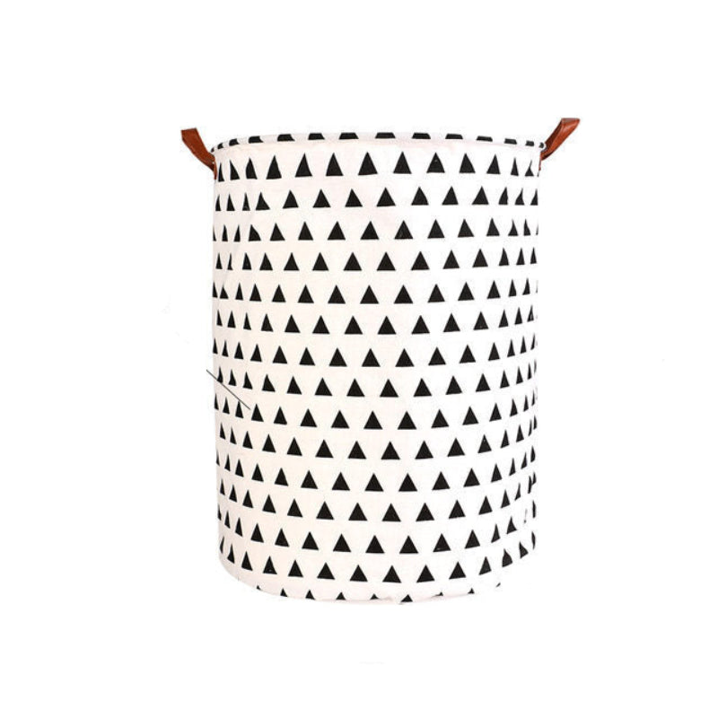 Black and white geometric patterned laundry basket with dimensions and material information on a white background