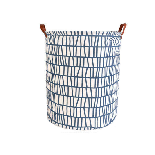 A collection of ten folding laundry baskets in various geometric and patterned designs, predominantly in black, white, and blue colors.