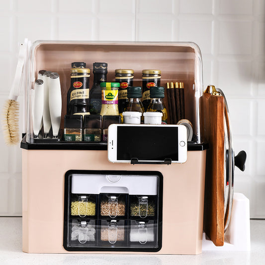 Kitchen organizer with spices, bottles, and a phone stand on a tiled wall background