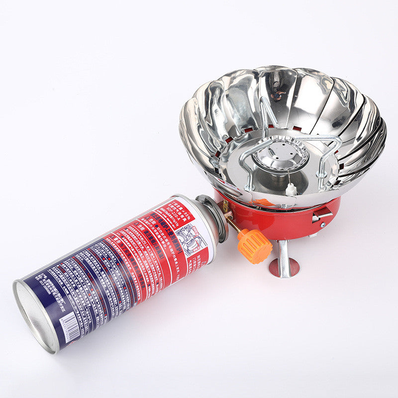 Portable camping stove with a canister on a white background