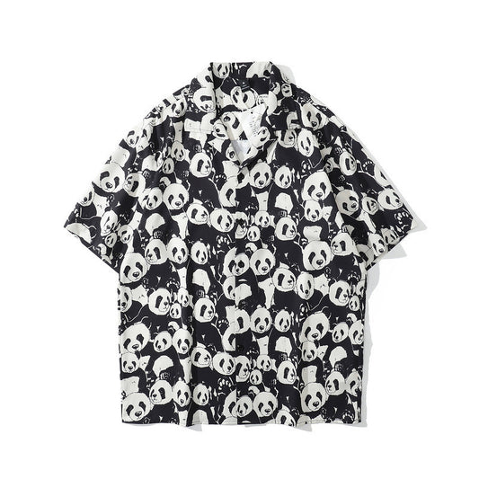 A short-sleeved shirt with a mix of geometric and cartoon patterns, featuring a collar and short sleeves.