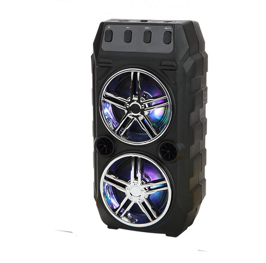 Black speaker with wheel design and measurements indicated.