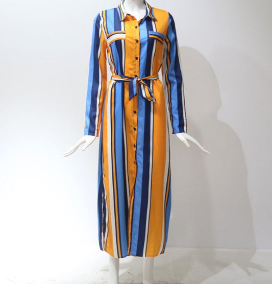Striped dress with blue and orange pattern on a mannequin against a white background