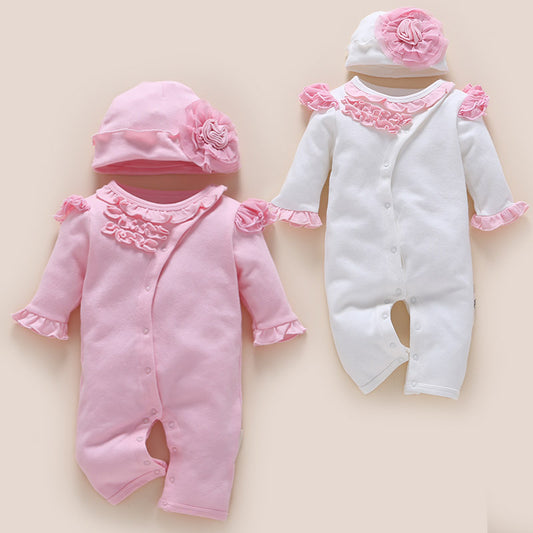 Two baby outfits, one pink and one white, with floral details on a beige background.