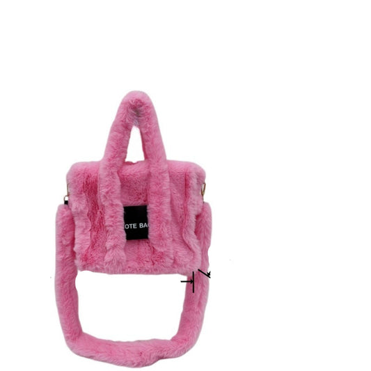 Pink fluffy bag with measurements and weight on a white background