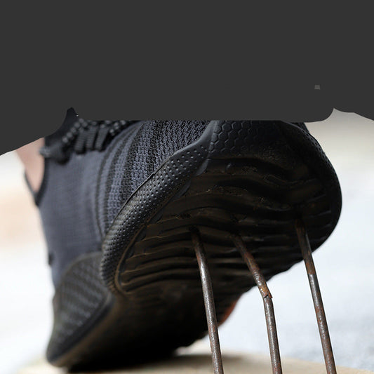 Black Kevlar shoe with text 'Stab Resistant Kevlar' and 'Anti penetration force of protective foot >= 1100N'.