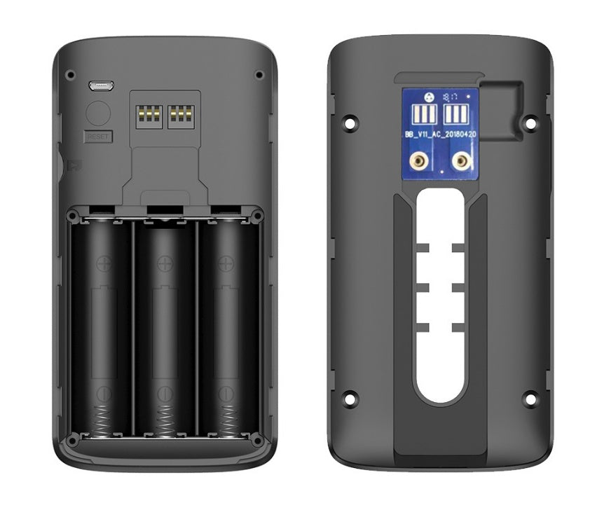 Two views of a black electronic device with battery compartments and connectors on a white background