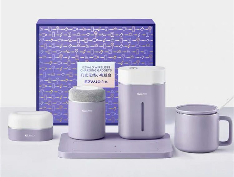 A set of purple-colored electronic devices including a charging base, humidifier, and Bluetooth speaker, presented with its packaging box.
