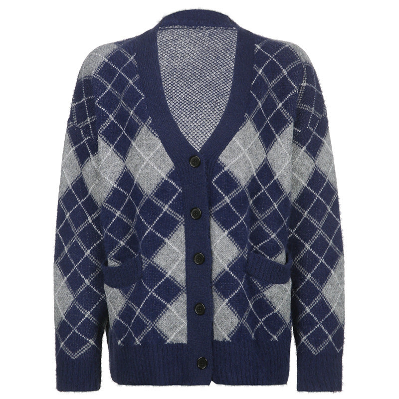Navy and gray argyle patterned cardigan on a white background