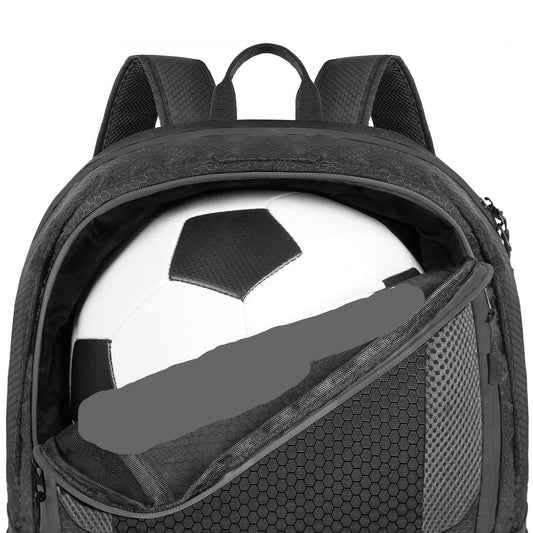 Black backpack with a soccer ball in the compartment labeled 'Ball Compartment'.