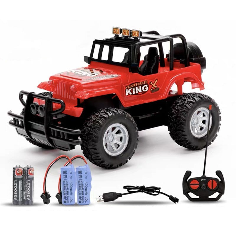 Red toy truck with remote control, batteries, and charging line on a white background