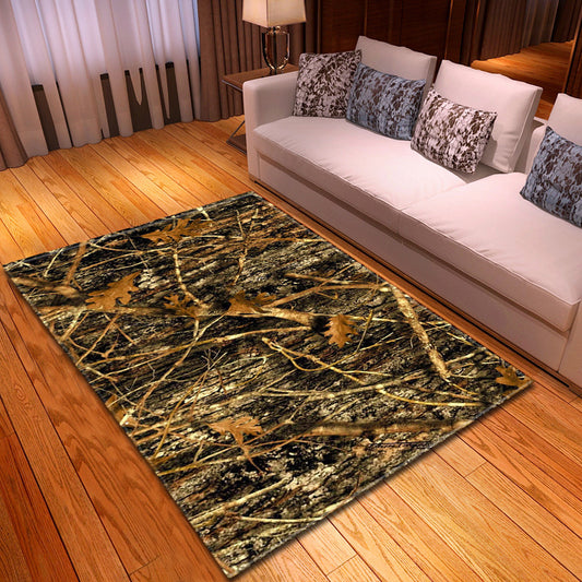 A rectangular rug with a camouflage pattern laid out on a wooden floor, with a white sofa and patterned pillows in the background.