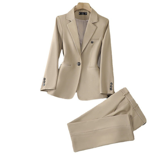 Beige suit jacket and pants on a white background