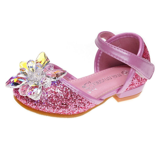 Pink glittery sandal with a decorative flower on a white background