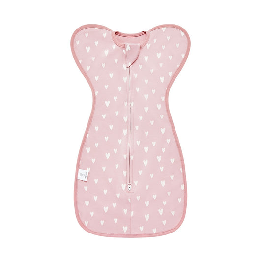 Pink baby sleeping bag with heart pattern on a white background