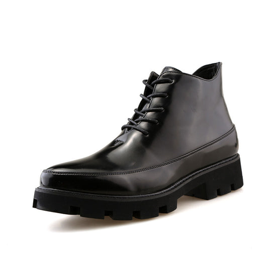 Black leather boot with a thick sole on a white background