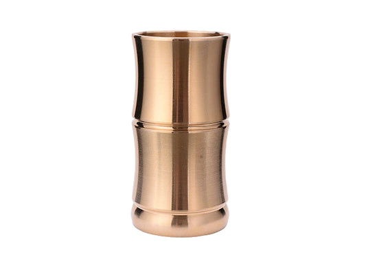 Bronze-colored cylindrical object with measurements on a light background