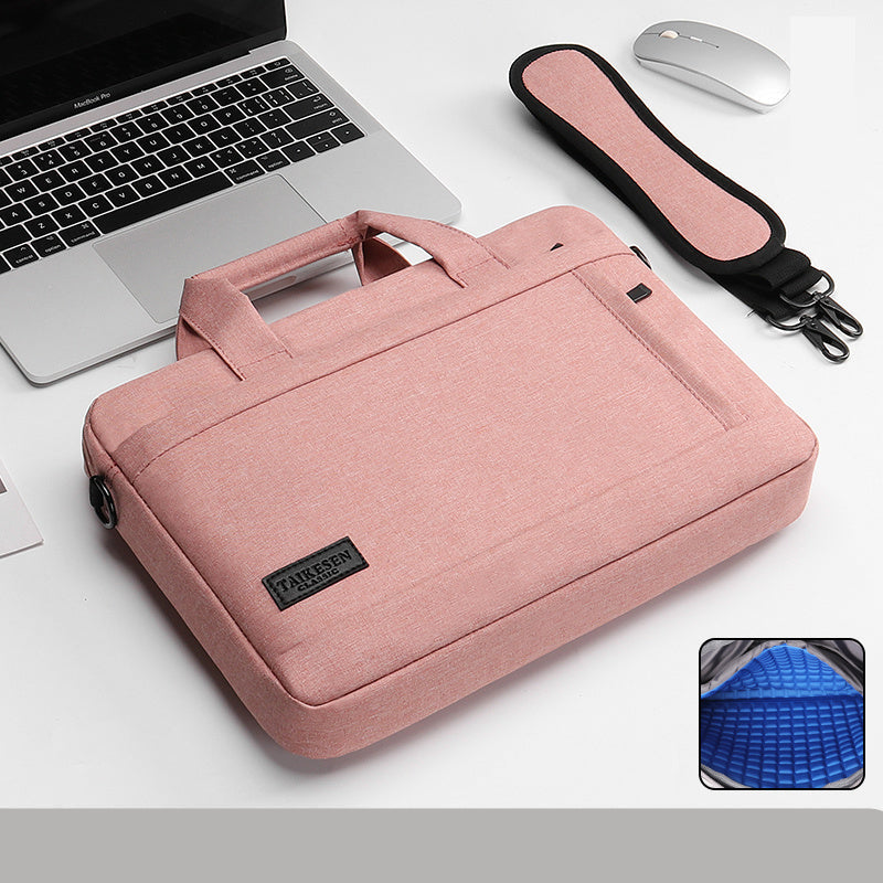 Pink laptop bag with a laptop, mouse, and strap on a white background