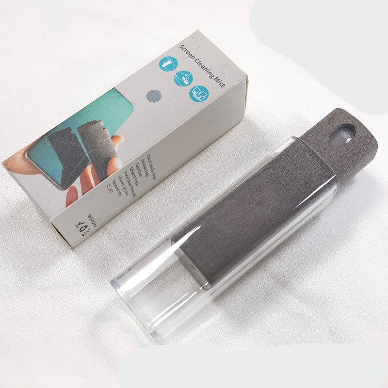 An advertisement showing a 2-in-1 screen cleaner with a spray bottle and a built-in microfiber wipe, being used to clean a smartphone screen.