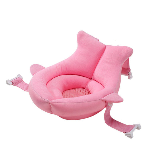 Pink shark-shaped baby seat on a white background
