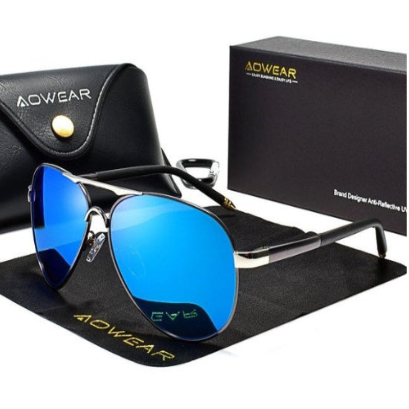 A man wearing blue pilot sunglasses with a large frame.