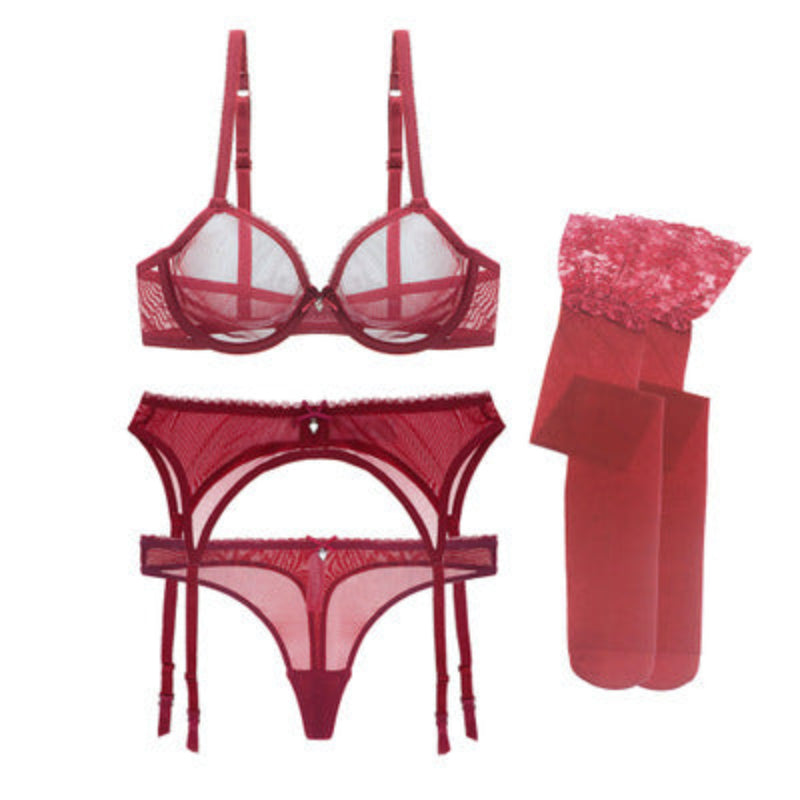 Red lingerie set with bra, panties, and socks on a white background