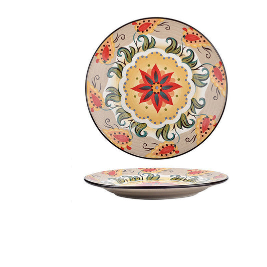 Decorative ceramic plate with floral patterns on a white background