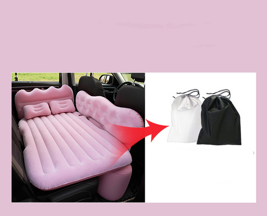 Inflatable car bed with storage bags on a pink background