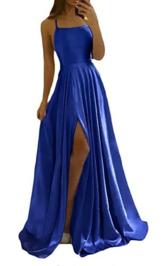 Blue evening gown with a slit on a white background