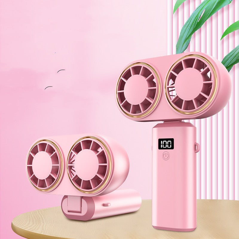 Pink portable fan with digital display fan on a pink background