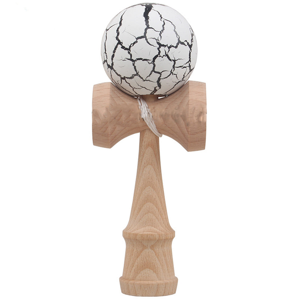 A selection of bamboo kendama toys with balls in various colors including blue, green, white with a red crack pattern, and red with a yellow crack pattern.
