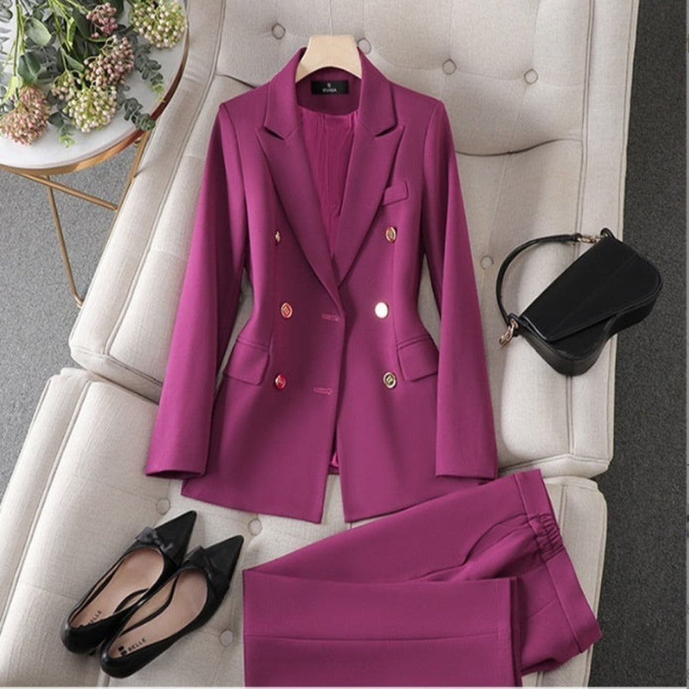 Purple suit with pants and shoes on a white chair