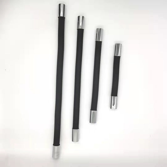 Set of four black and silver cylindrical tools on a white background