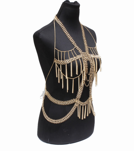 Gold chainmaille top on a black mannequin