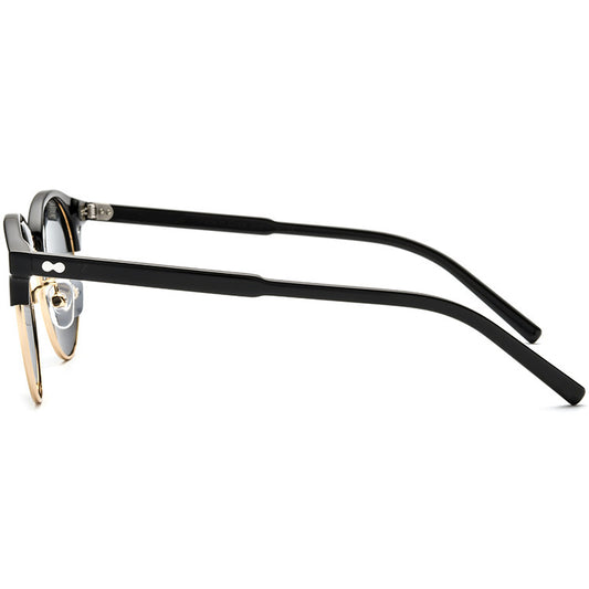 Black eyeglasses with gold accents on a white background