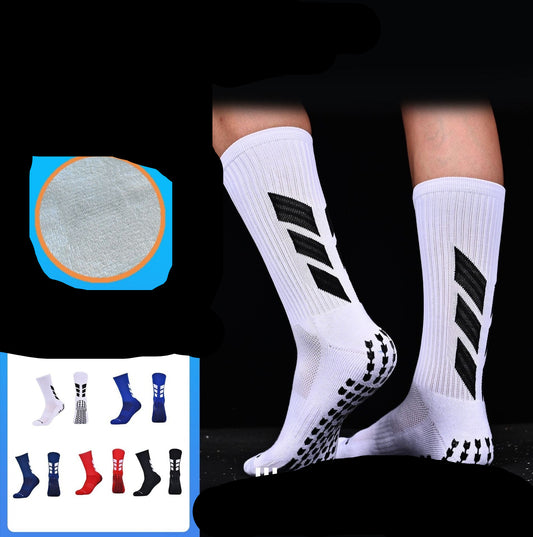 The image shows a pair of white soccer socks with black geometric patterns. The socks are designed with a non-slip dispensing towel bottom and marked with the text '5120 dispensing mid-tube socks', indicating the product number.